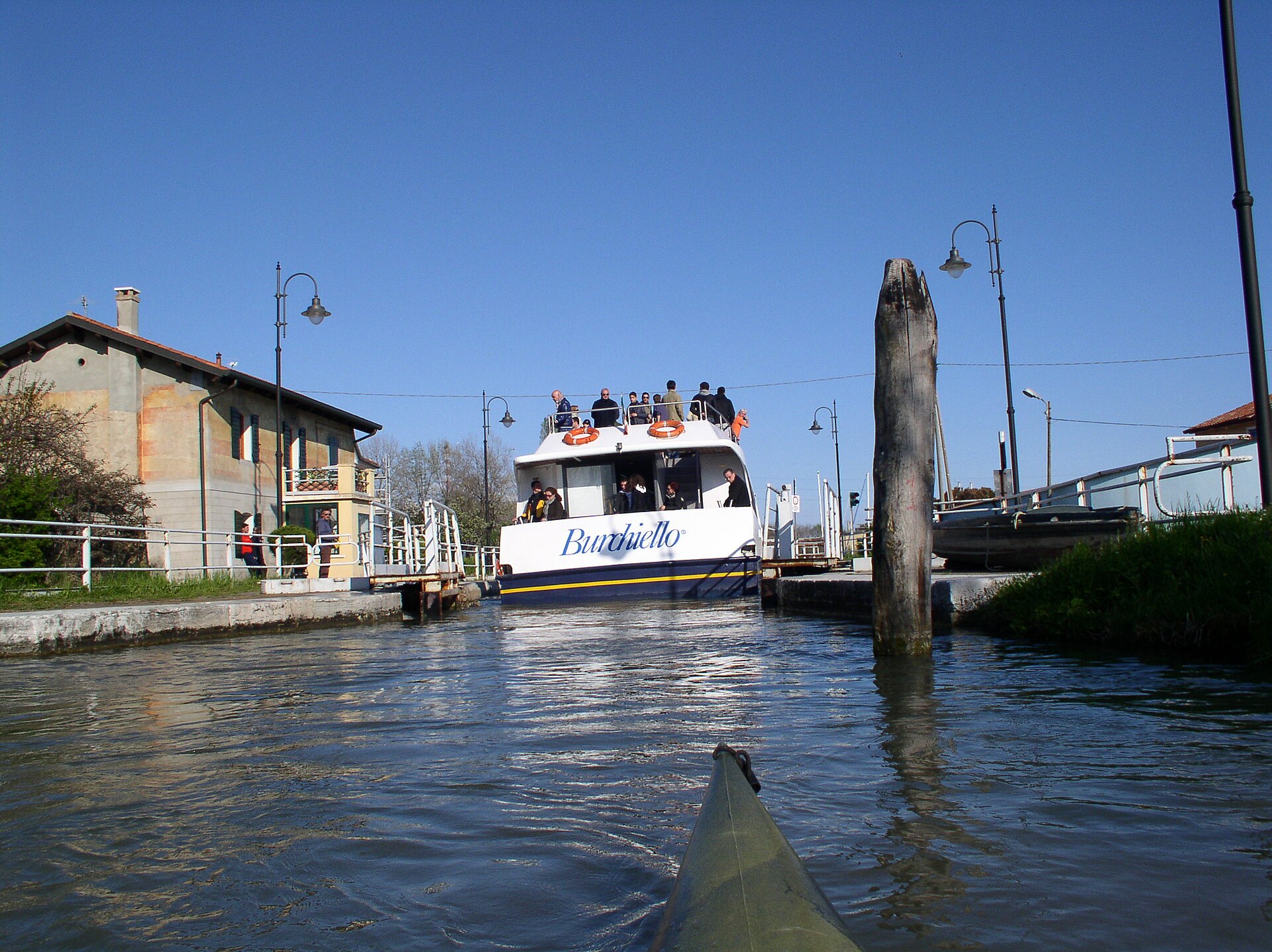 A tourist boat travels up the Naviglio del Brenta, heir to the historic Burchiello